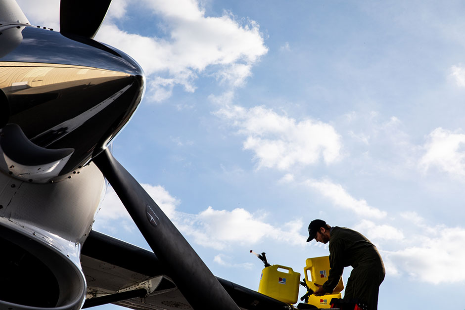 A plane fueling up with ASTM D7566 aviation fuel made from Dimensional Energy high-performance synthetic hydrocarbons.