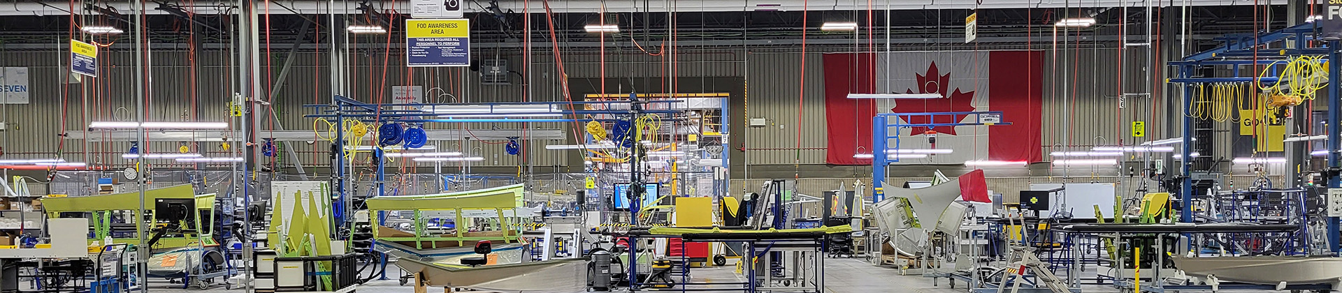 Interior of Canada factory with Canadian flag hanging on wall